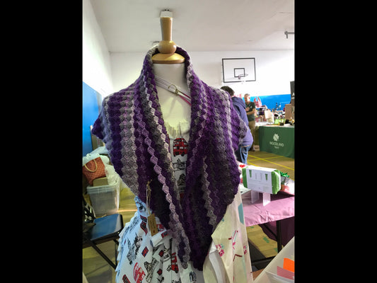Hand crocheted purple triangular shawl style scarf.